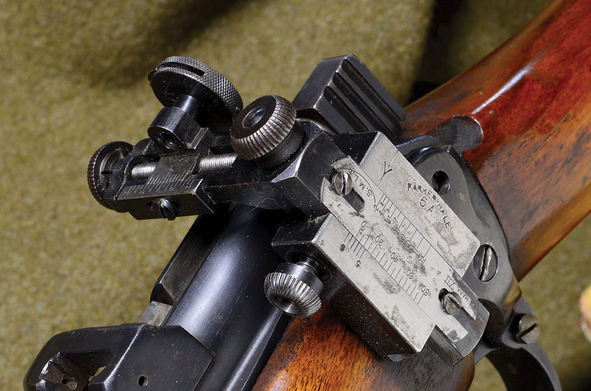 The Parker-Hale Model 5A receiver sight. The six-hole aperture allows the shooter to adapt the aperture size to the light conditions.